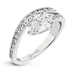 Bold shapes crafted in 18k white gold and diamonds make this ring unforgettable.