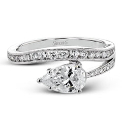 Bold shapes crafted in 18k white gold and diamonds make this ring unforgettable.