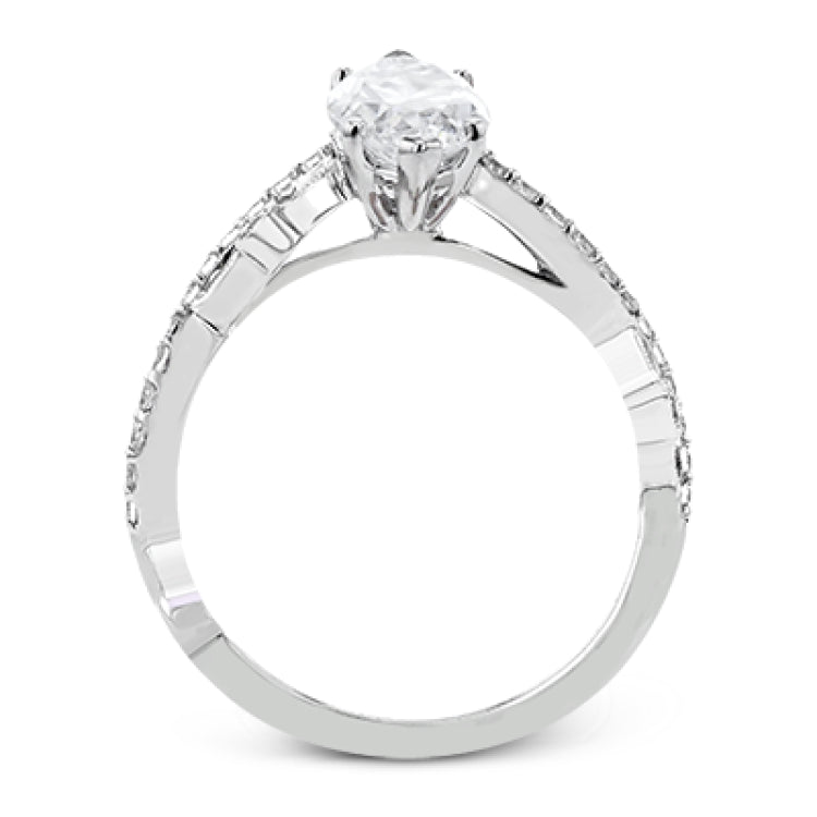 A unique twisting design on the band makes this engagement ring stand out from the rest. This particular style is made to perfect hold a marquise shaped center stone.