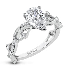 This unique 18k white gold engagement ring features .22 ctw of white diamonds in an interwoven design.
