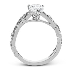 This unique 18k white gold engagement ring features .22 ctw of white diamonds in an interwoven design.