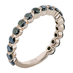 The perfect compliment to a solitare, this 7-stone diamond wedding band in 14K white gold adds just the right amount of sparkle