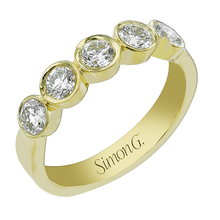 The perfect compliment to a solitare, this 7-stone diamond wedding band in 14K yellow gold adds just the right amount of sparkle