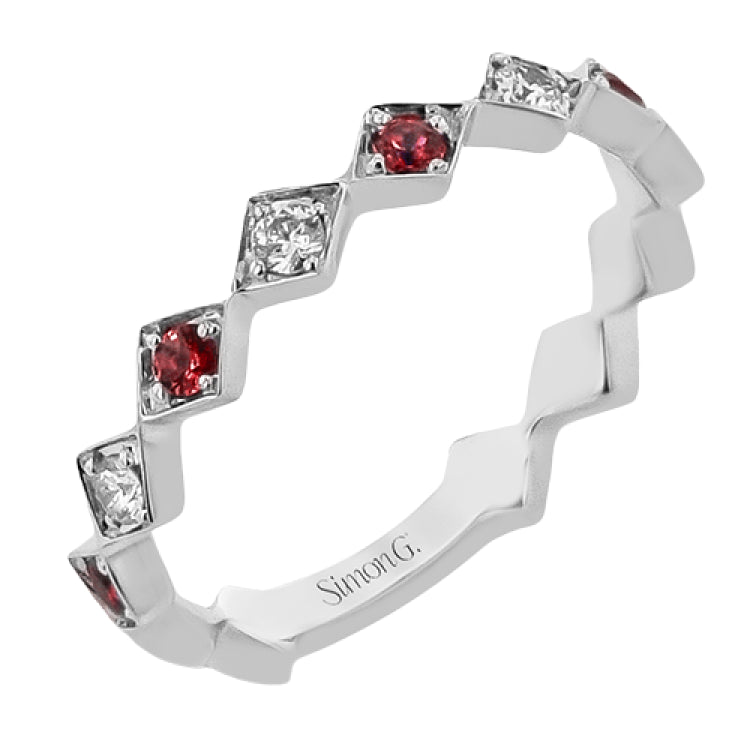 From our stackable collection this geometric shaped ring in 14 Kt white gold has a 0.24 ctw diamonds and a bit of whimsy
