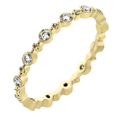 This diamond eternity band from our stackable collection in 14K yellow gold, has alternating bezel set diamonds 0.31 ctw. and gold beads.