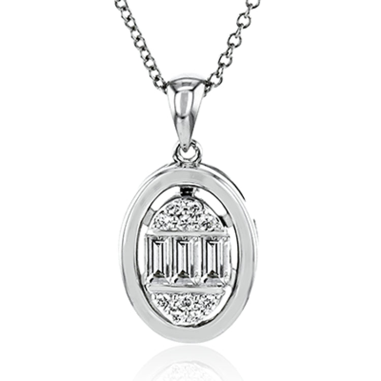 A one-of-a-kind diamond pendant features perfectly cut baguettes 0.27 ctw, and round brilliant diamonds .07 ctw, suspended in an oval shaped gold casing on 19” chain