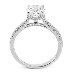Featuring our new underhalo design, a ring of diamonds sits underneath the center stone in this bridal ring, giving a remarkable side view.