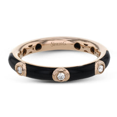 A sleek modern classic, this 18k gold and enamel ring contains .07 ctw of bezel set white diamonds.