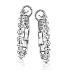 A STAPLE IN ANY JEWELRY WARDROBE, THESE 18k WHITE GOLD HOOPS FEATURING 1CTTW ROUND DIAMONDS  MOVE PERFECTLY FROM DAY TO NIGHT.