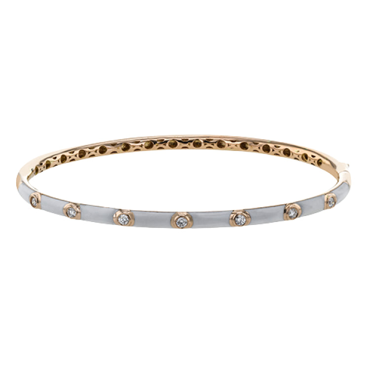 Stacked or worn alone, this enamel bangle provide the perfect touch, with .21 ctw of white bezel set diamonds.