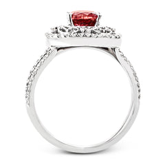 Delicate filigree adorns this vintage inspired ring, while a stunning gemstone center lends an essential dose of color.