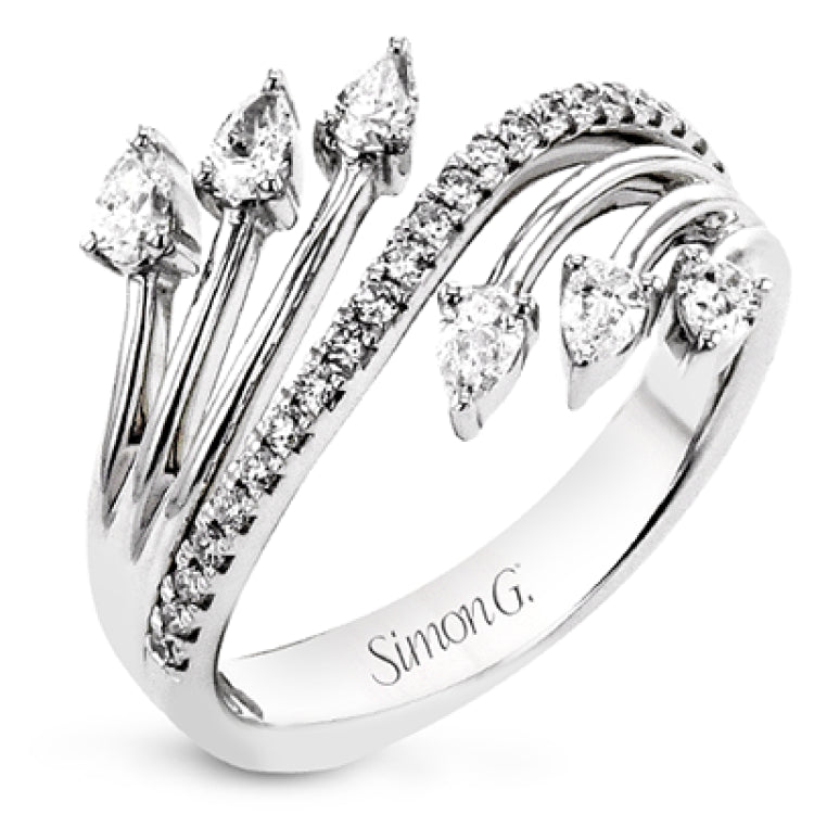 Lines of diamonds and gold wrap around your finger in this dynamic ring which combines round and pear shaped diamonds.