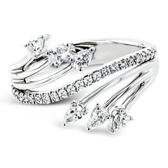 Lines of diamonds and gold wrap around your finger in this dynamic ring which combines round and pear shaped diamonds.