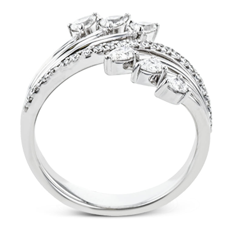 Lines of diamonds and gold wrap around your finger in this dynamic ring which combines round and pear shaped diamonds.
