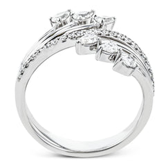 Lines of diamonds and gold wrap around your finger in this dynamic ring which combines round and pear shaped diamonds.