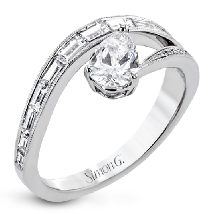 Like lightning zig-zagging across the sky, this dynamic 18k white gold ring contains a flowing line of .62 ctw baguette diamonds and one .55 ct pear shaped diamond set at an angle.
