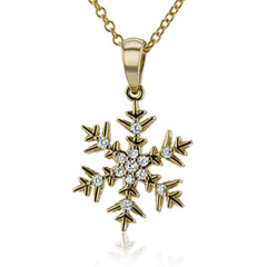 Outshine the brightest winter snow in this sparkling snowflake pendant crafted from 18k white gold and set with .07 ctw of white diamonds.