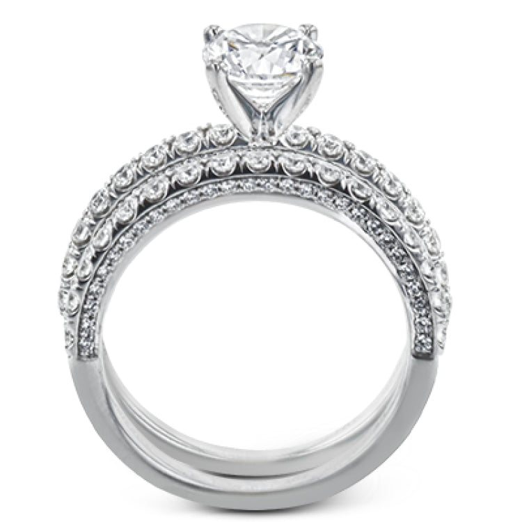 This wedding band is a classic choice with a straight design and .55 ctw of white diamonds.
