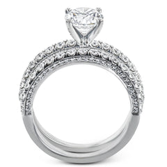 This wedding band is a classic choice with a straight design and .55 ctw of white diamonds.