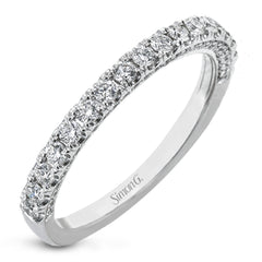 This wedding band is a classic choice with a straight design and .55 ctw of white diamonds.
