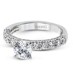 This wonderful band is a classic choice for a wedding band or stacking ring, set with .75 ctw of white diamonds.