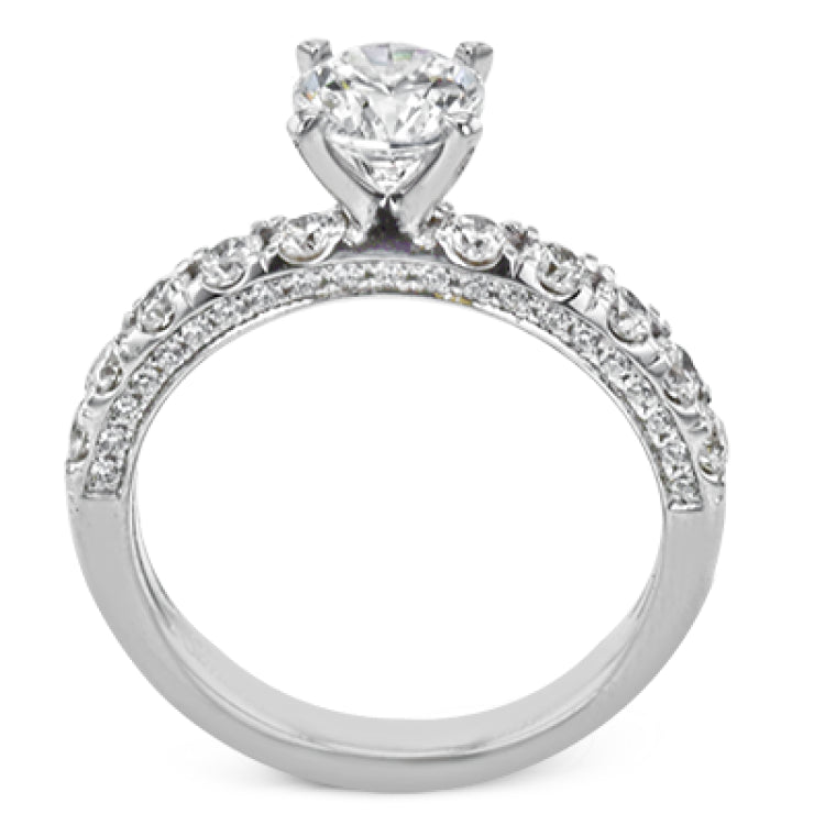 This wonderful band is a classic choice for a wedding band or stacking ring, set with .75 ctw of white diamonds.
