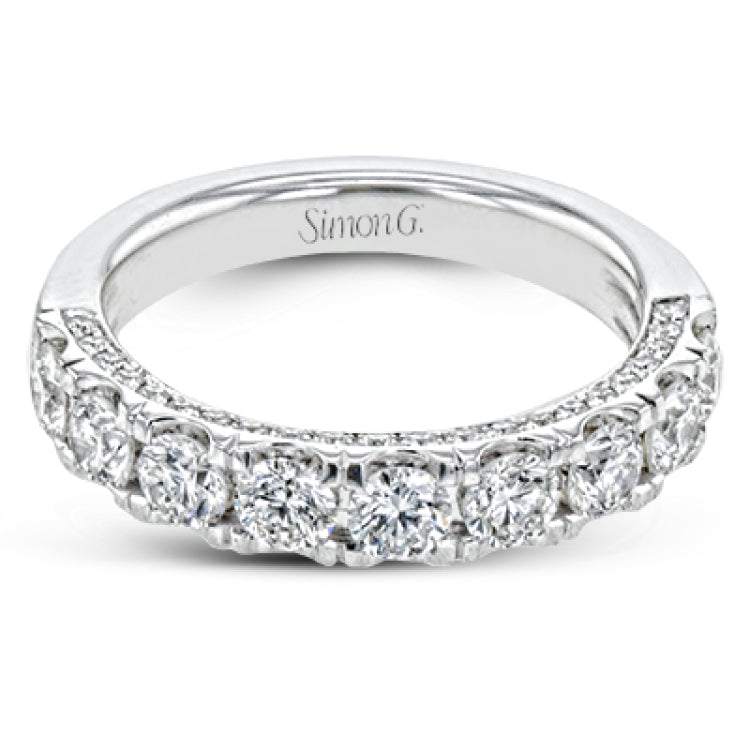 This straight band is anything but ordinary, containing an impressive 1.44 ctw of white diamonds.
