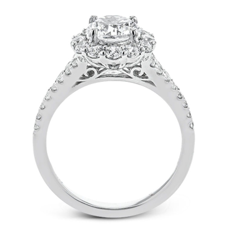 This lovely engagement ring provides an impressive amount of sparkle with .73 ctw in a halo design.