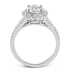 This lovely engagement ring provides an impressive amount of sparkle with .73 ctw in a halo design.