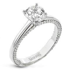 While lines of diamonds extending down both sides of this engagement ring, the round center stone is enhanced by the pure beauty of the 18k white gold on top.