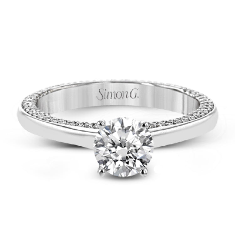 While lines of diamonds extending down both sides of this engagement ring, the round center stone is enhanced by the pure beauty of the 18k white gold on top.
