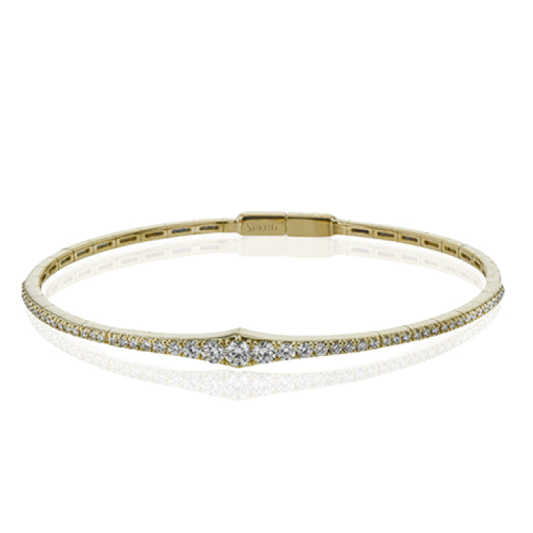This bangle is a new take on a classic with a slightly tapered design and .88 ctw of white diamonds.