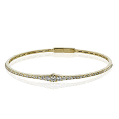 This bangle is a new take on a classic with a slightly tapered design and .88 ctw of white diamonds.
