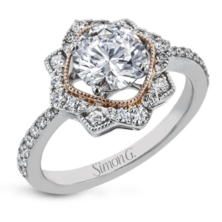 This detailed 18k white and rose gold ring design features .43 ctw of white diamonds.