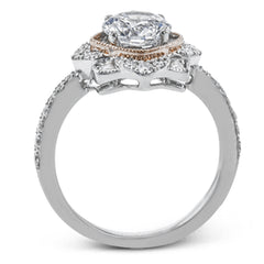 This detailed 18k white and rose gold ring design features .43 ctw of white diamonds.