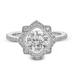 This detailed 18k white and rose gold ring design features .43 ctw of white diamonds.