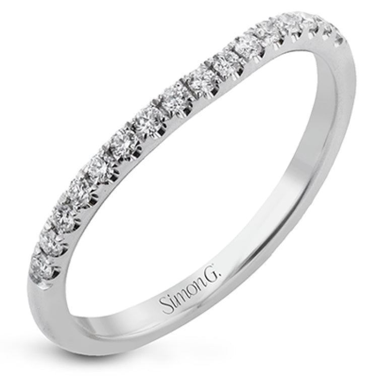 This criss-cross design engagement ring shimmers with 0.15 ctw round diamonds and a halo of gold strands wrapped around the center