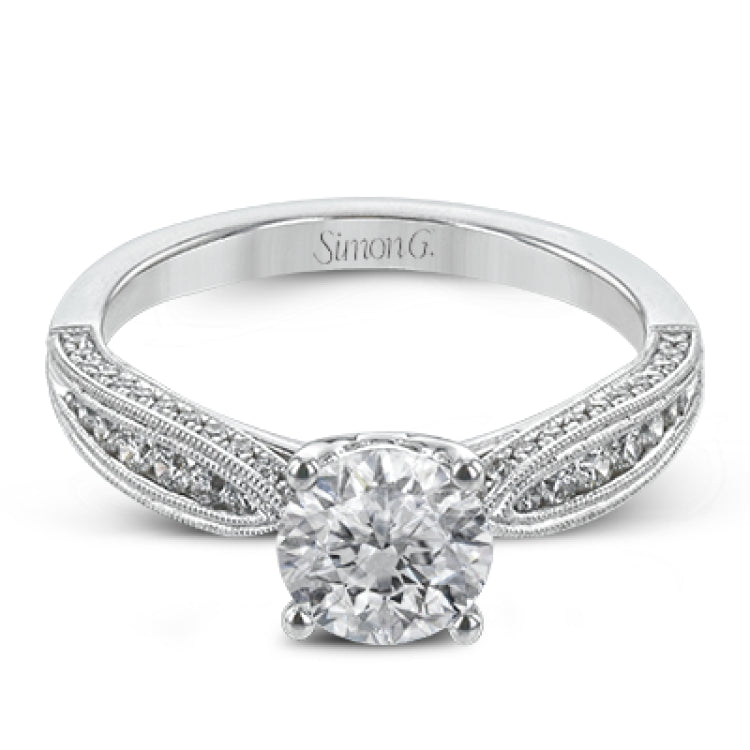 Delightful details abound in this 18k white gold engagement ring, set with .33 ctw of side diamonds.