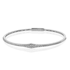 This bangle is a new take on a classic with a slightly tapered design and .88 ctw of white diamonds.