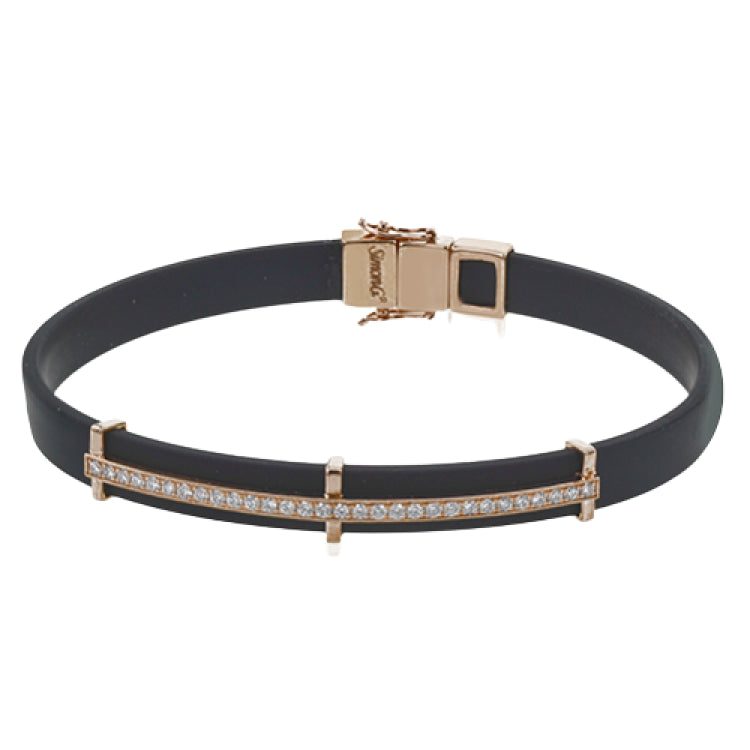This bold bracelet features black rubber with 14k gold accents set with .35 ctw of white diamonds.