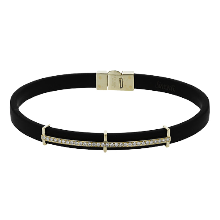 This bold bracelet features black rubber with 14k gold accents set with .35 ctw of white diamonds.