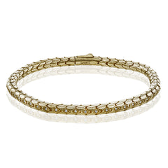 This men's bracelet features .32 ctw of black diamonds set into 14k gold with a brushed finish.