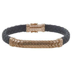 This modern men's bracelet combines black leather and 14k rose gold to make a bold statement.