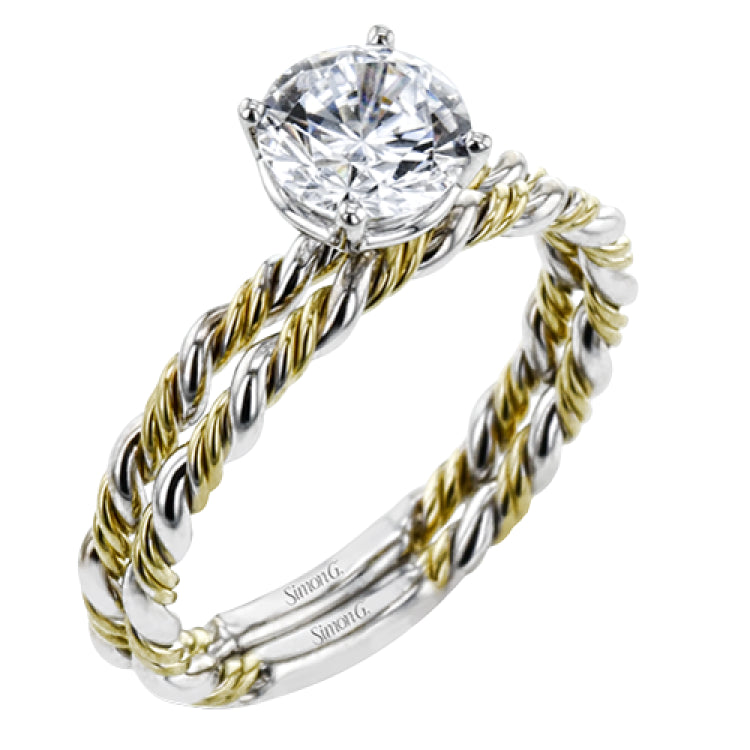 Two tones of 18k gold twist around each other in this contemporary yet timeless engagement ring.