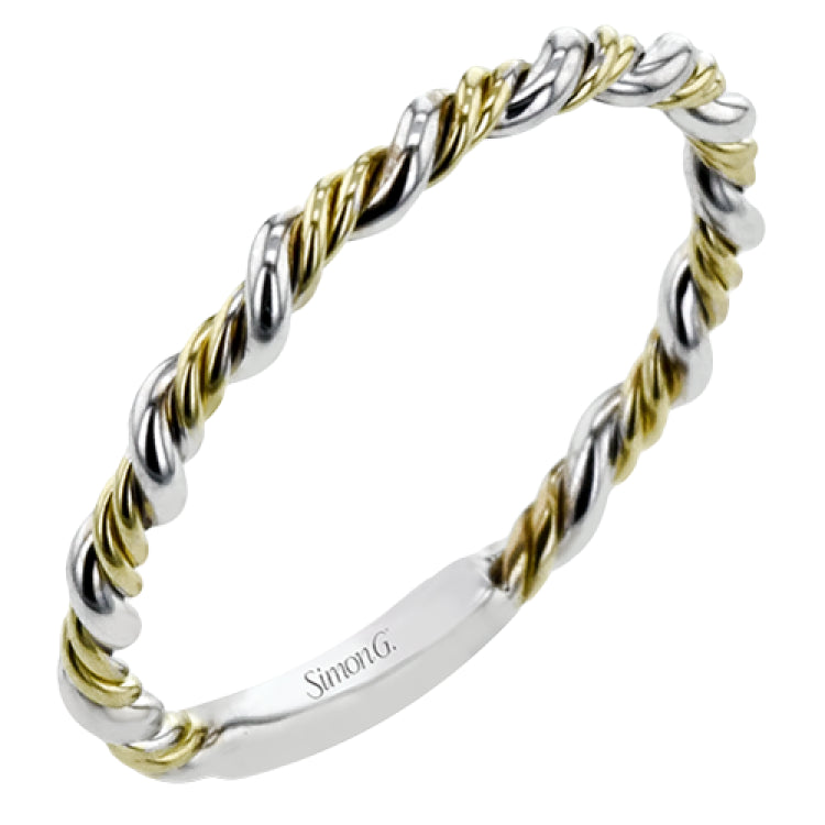 Two tones of 18k gold twist around each other in this contemporary yet timeless engagement ring.