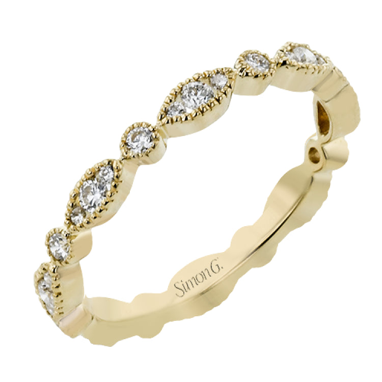 This ring is perfect for stacking with a distinctive design set with  .20 ctw of diamonds.