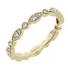 This ring is perfect for stacking with a distinctive design set with  .20 ctw of diamonds.
