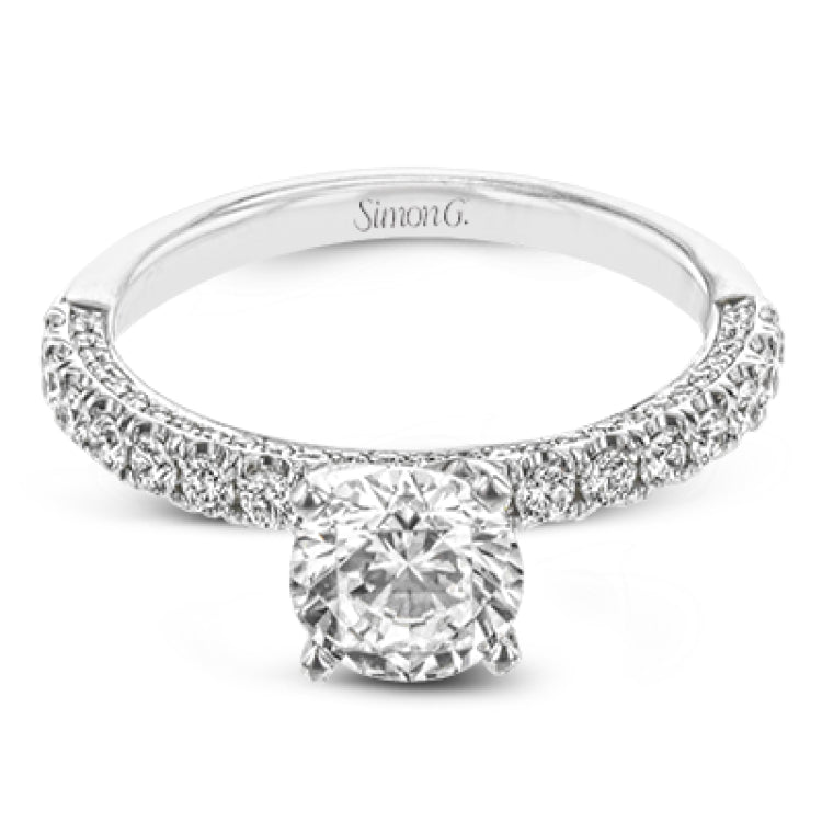 This engagement ring is sure to shine, with a classic straight design set with .49 ctw of white side diamonds.