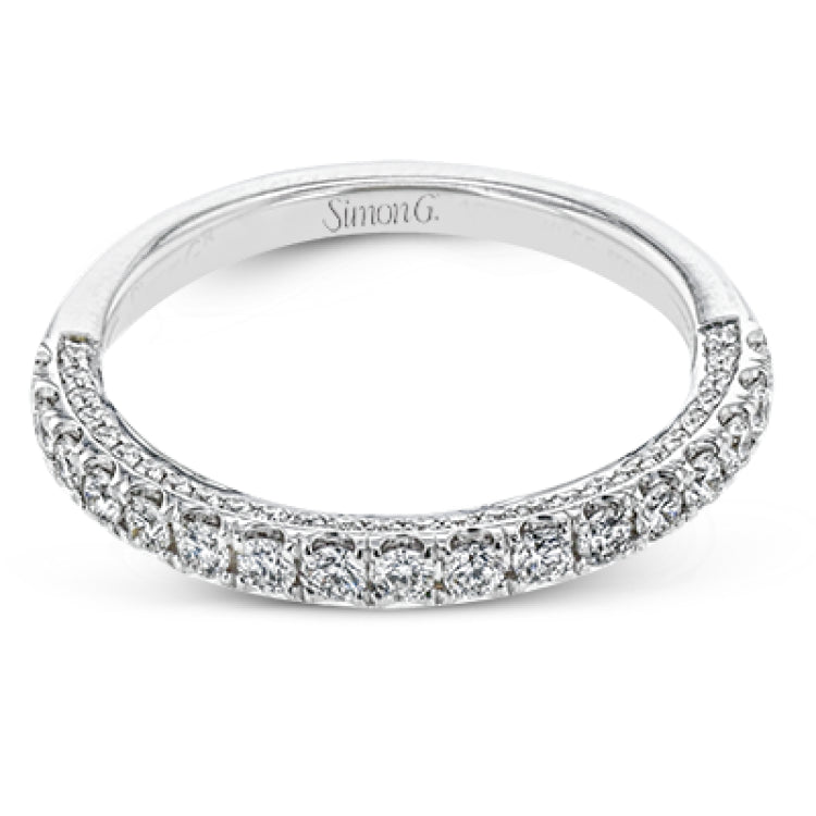 This engagement ring is sure to shine, with a classic straight design set with .49 ctw of white side diamonds.