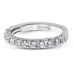 This engagement ring is sure to shine, with a classic straight design set with .75 ctw of white side diamonds.